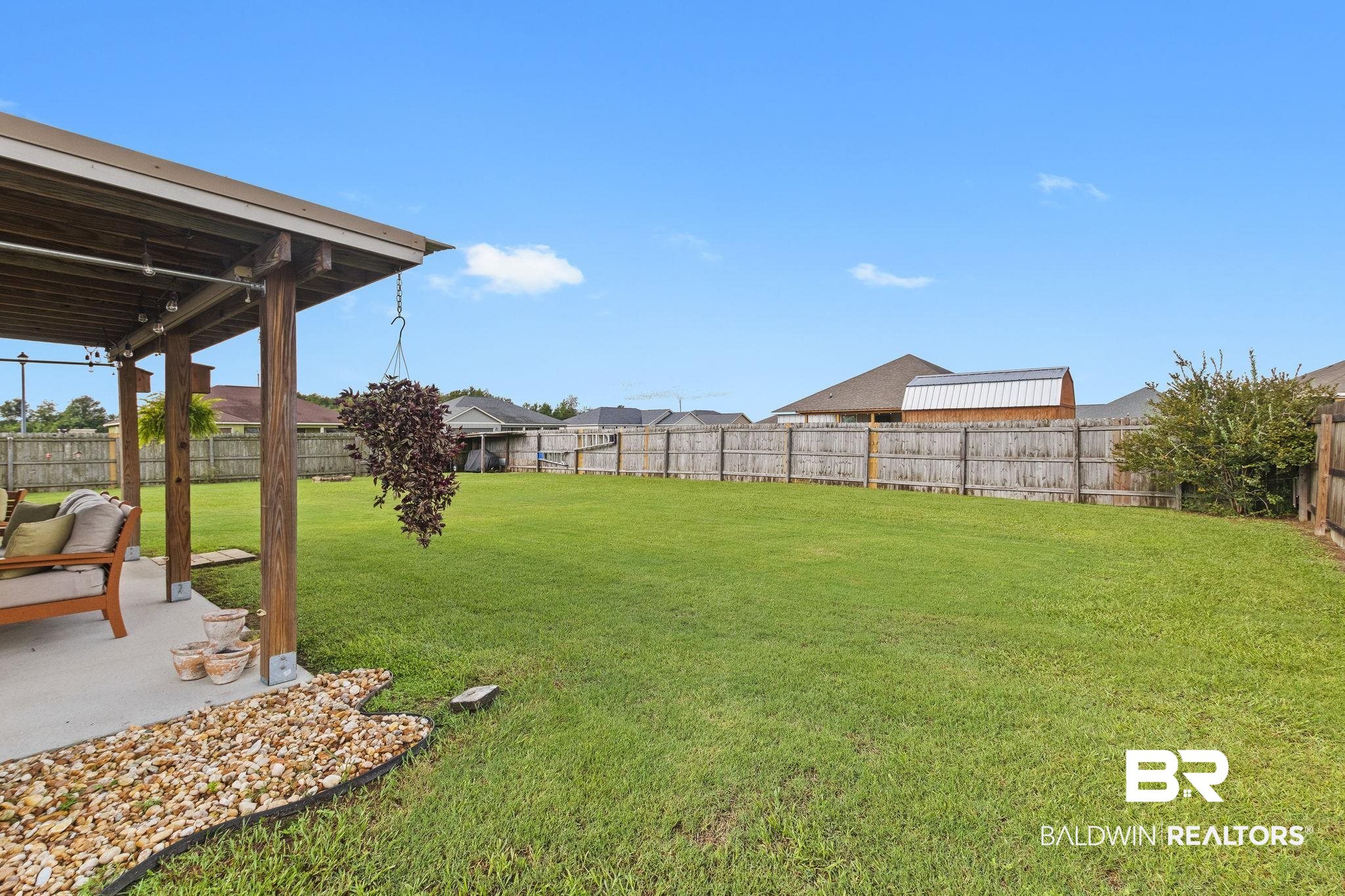 203 Lakefront Circle Summerdale, AL 36580 - Photo 66 of 69 View of yard with a patio