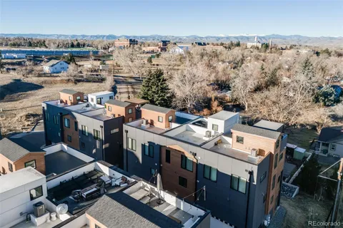 an aerial view of a city with lots of residential buildings