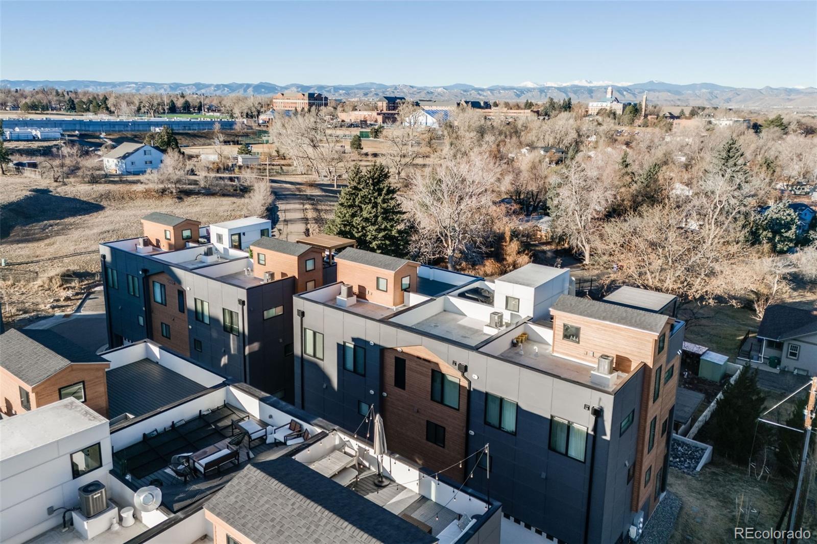 3011 West 53rd Avenue Denver, CO 80221 - Photo 39 of 44 a view of city and wooden deck