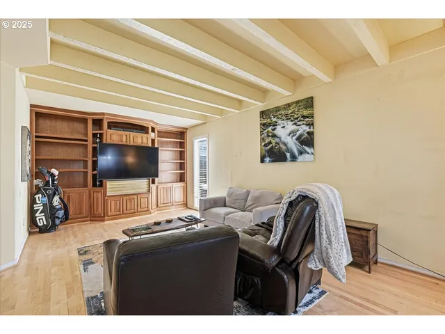 a view of a hallway with washer and dryer