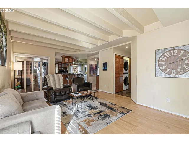a bathroom with a sink mirror and shower