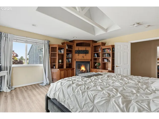 a view of backyard with wooden floor and a potted plant
