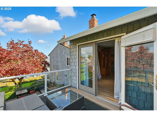 a kitchen with a sink a counter top space and cabinets