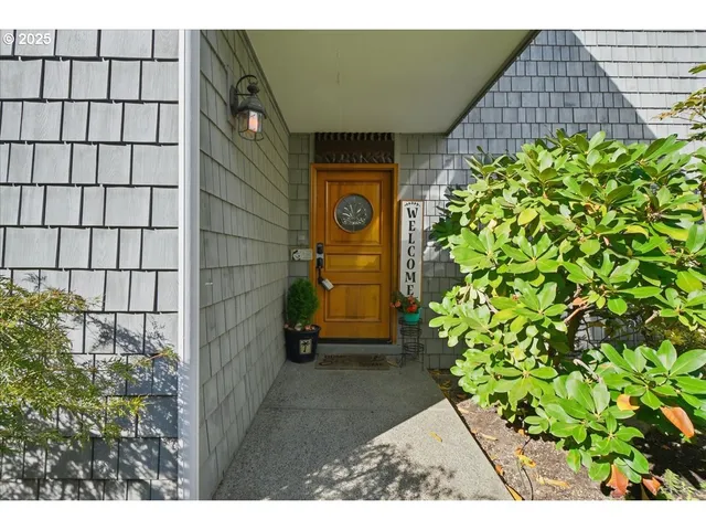 a view of living room kitchen with furniture and wooden floor
