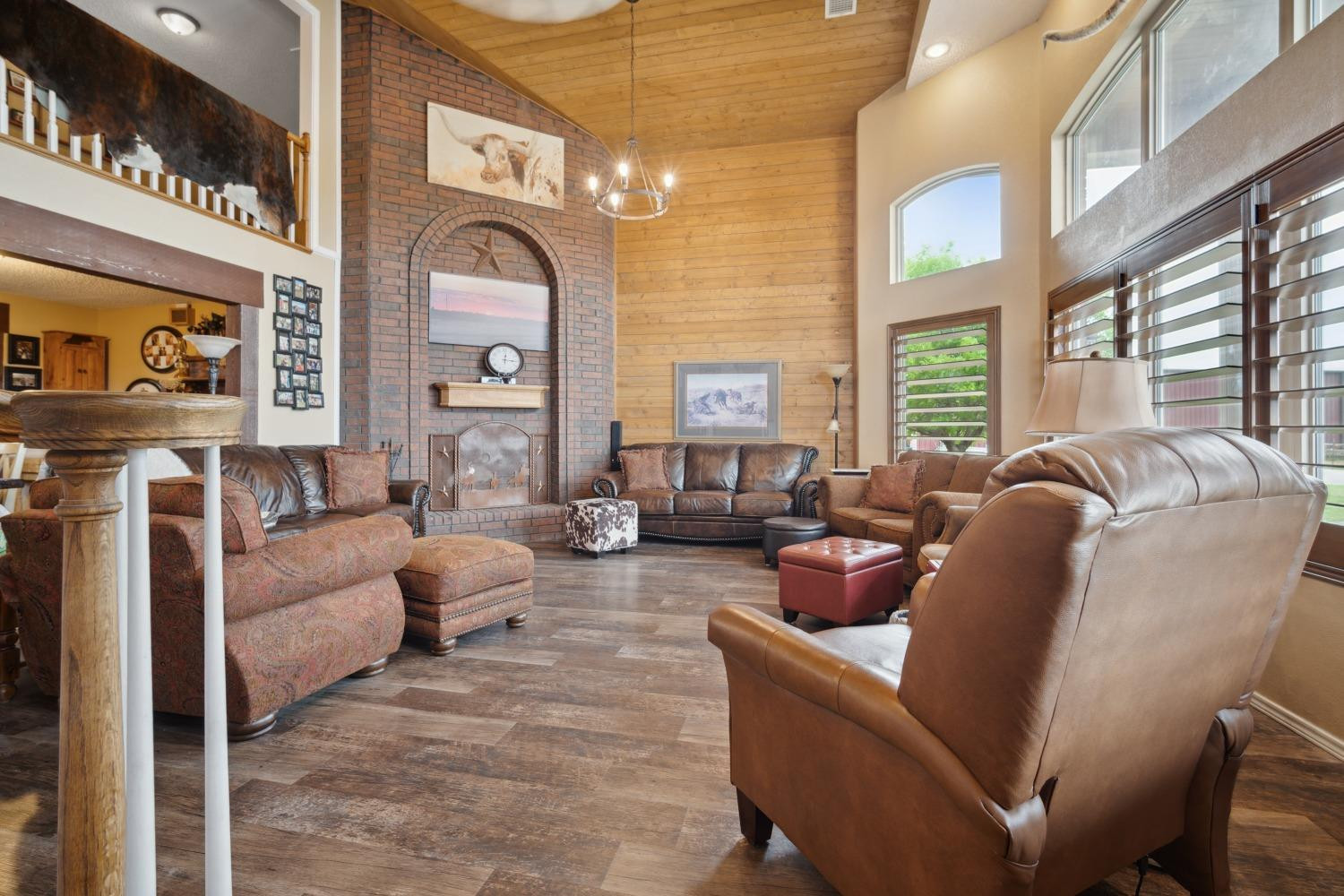 9002 Woodrow Road Wolfforth, TX 79382 - Photo 5 of 48 a living room with furniture and a large window
