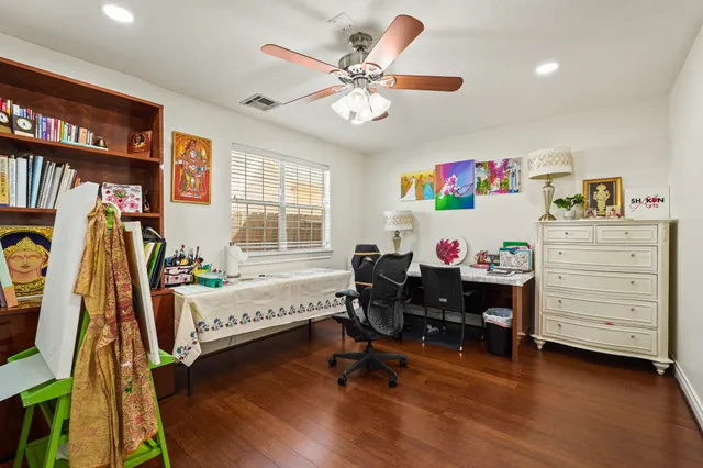a workspace with furniture and a window