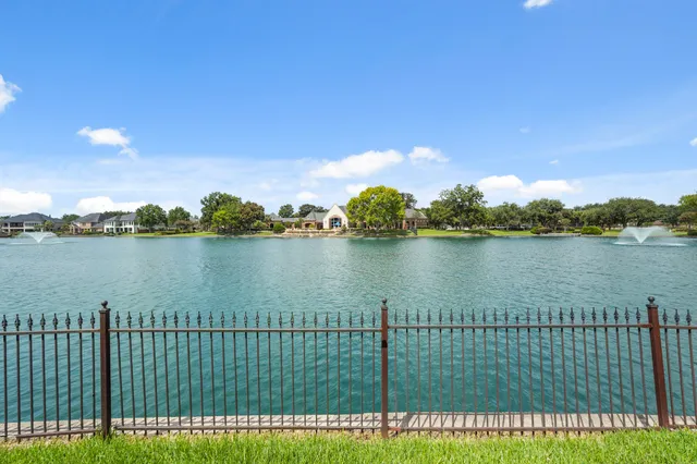 a view of a lake with a garden