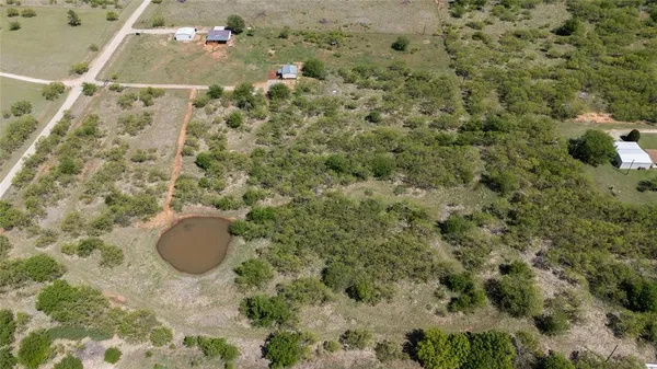 a view of a patio with wooden floor