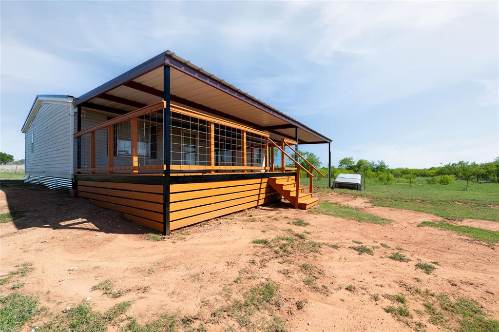 383 Soaring Eagle Trail Wichita Falls, TX 76310 - Photo 4 of 36 Manufactured home with large deck for entertaining.