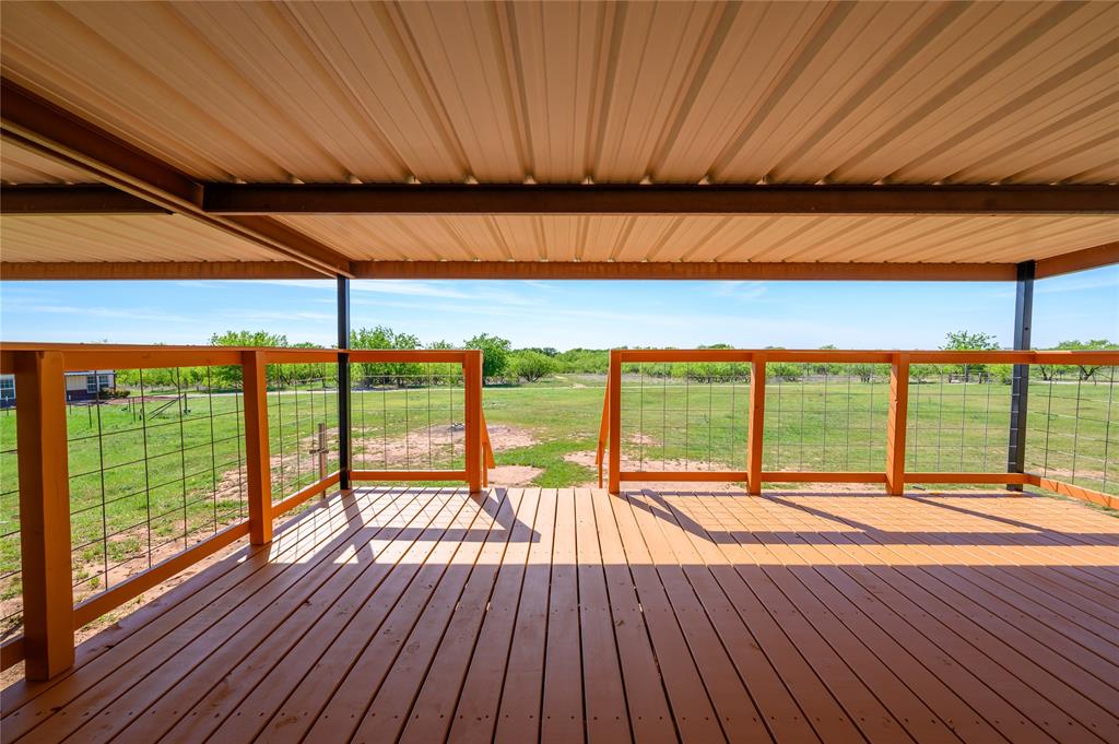 383 Soaring Eagle Trail Wichita Falls, TX 76310 - Photo 5 of 36 Deck with the view of the land.
