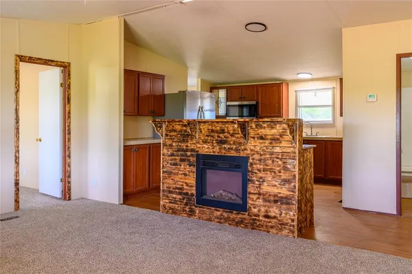 a view of a living room and bathroom