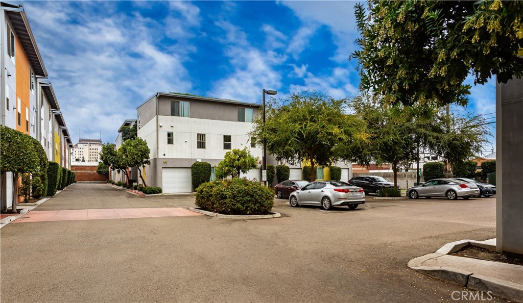 1759 Fulton Street Fresno, CA 93721 - Photo 7 of 24 a view of street with parked cars