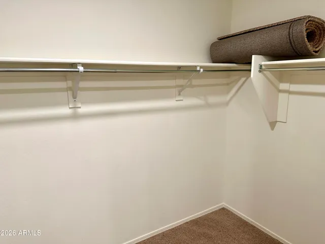 a view of a room with racks on the wall