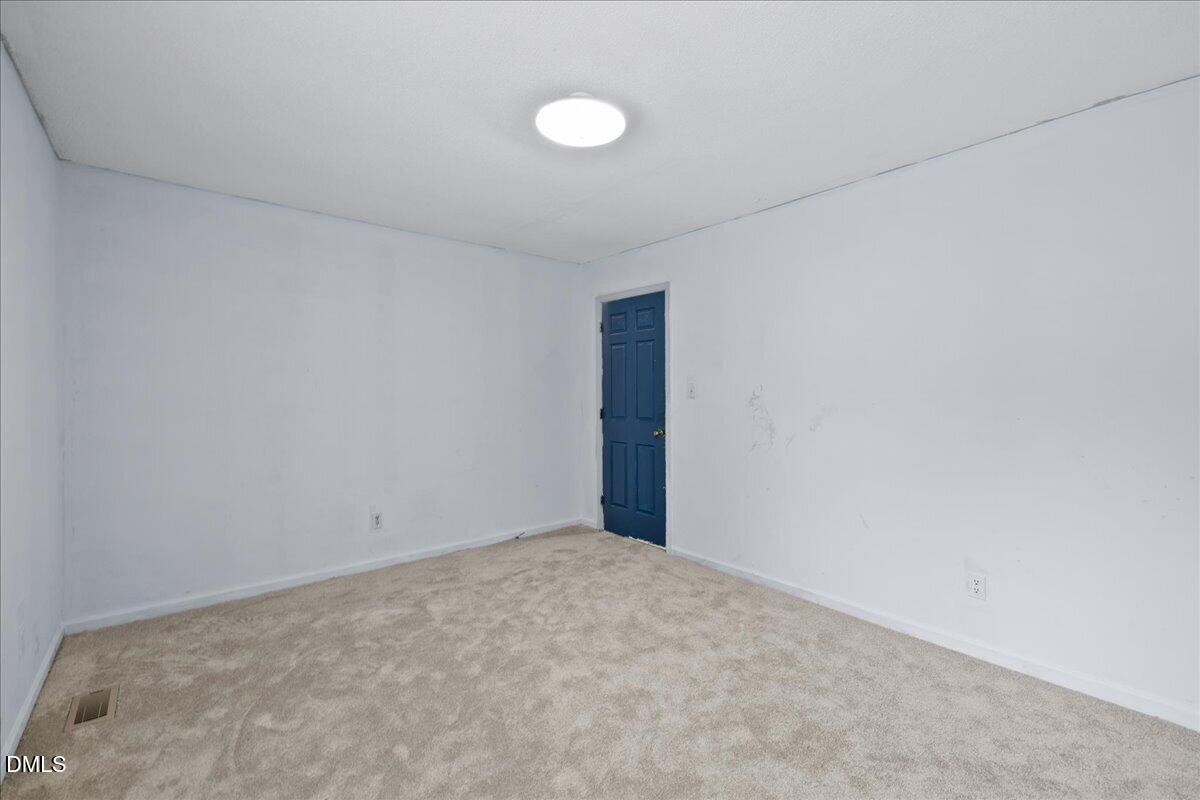 4409 Lake Ridge Drive Raleigh, NC 27604 - Photo 20 of 31 a view of an empty room