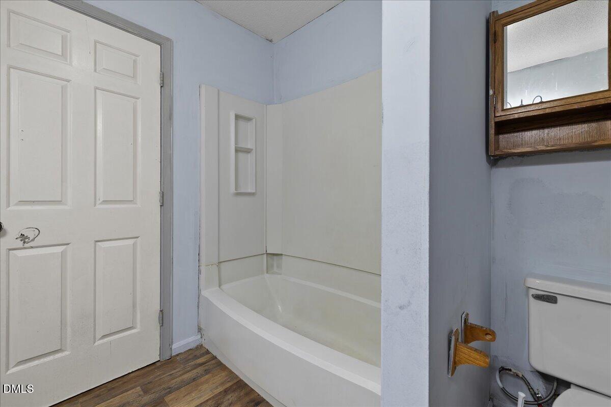 4409 Lake Ridge Drive Raleigh, NC 27604 - Photo 23 of 31 a bathroom with a bathtub