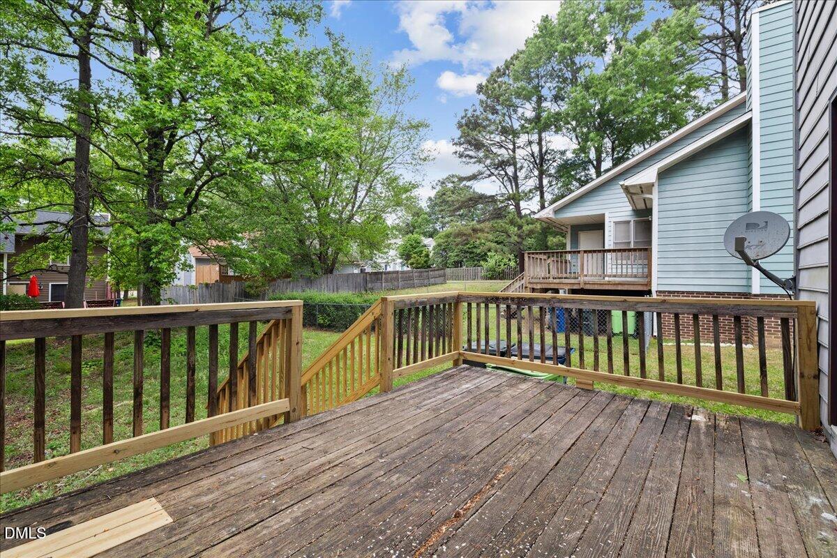4409 Lake Ridge Drive Raleigh, NC 27604 - Photo 29 of 31 a view of a wooden roof deck