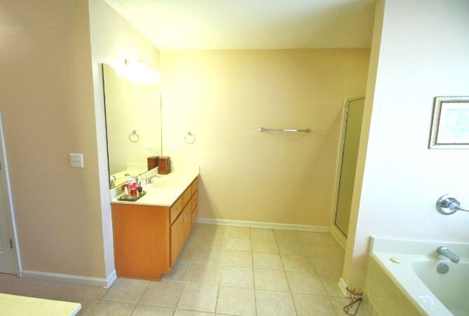 702 Riva Ridge Drive Crestview, FL 32539 - Photo 14 of 20 a bathroom with a bathtub and shower