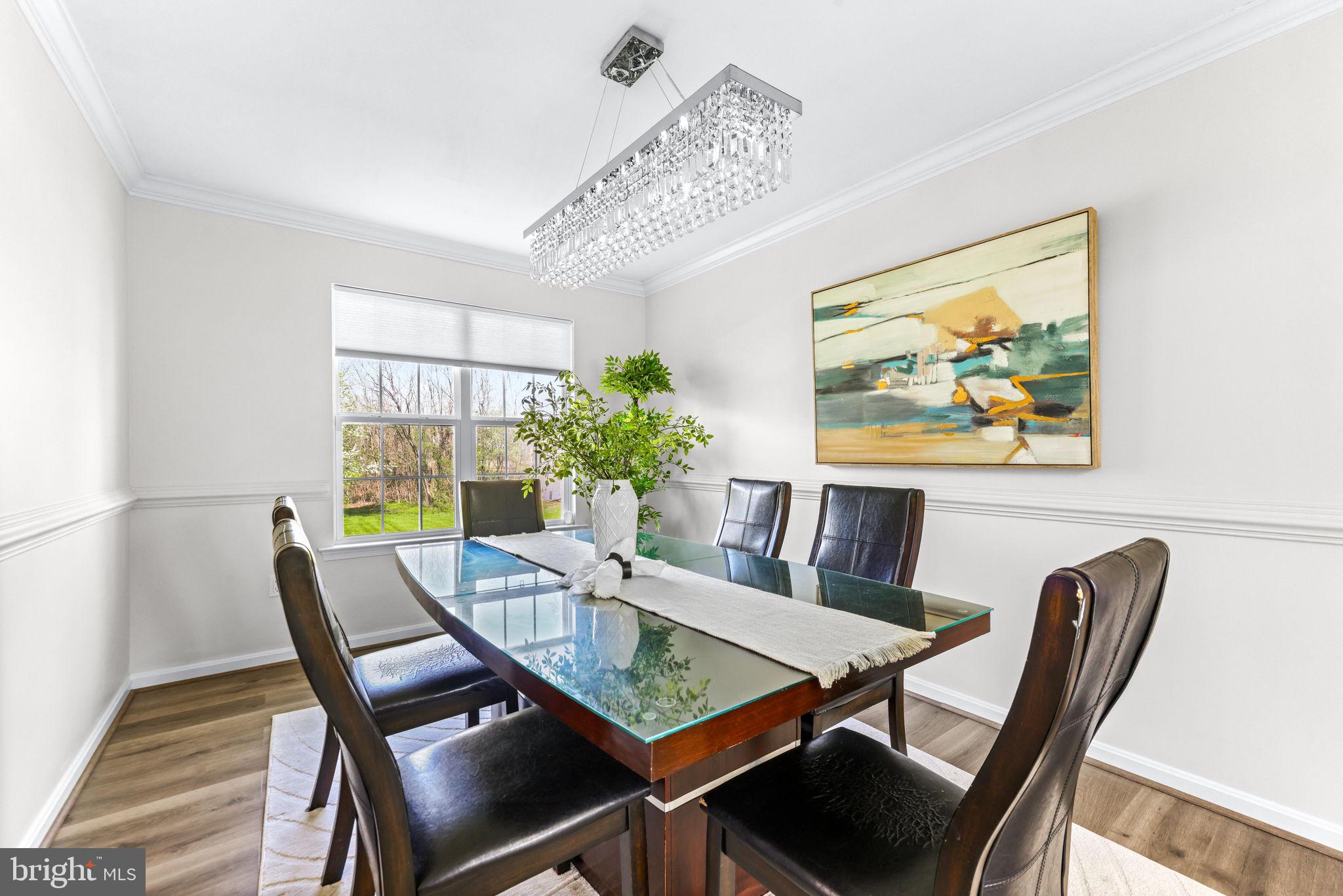 1439 Goodwood Avenue Baltimore, MD 21221 - Photo 11 of 49 a view of a dining room with furniture window and wooden floor