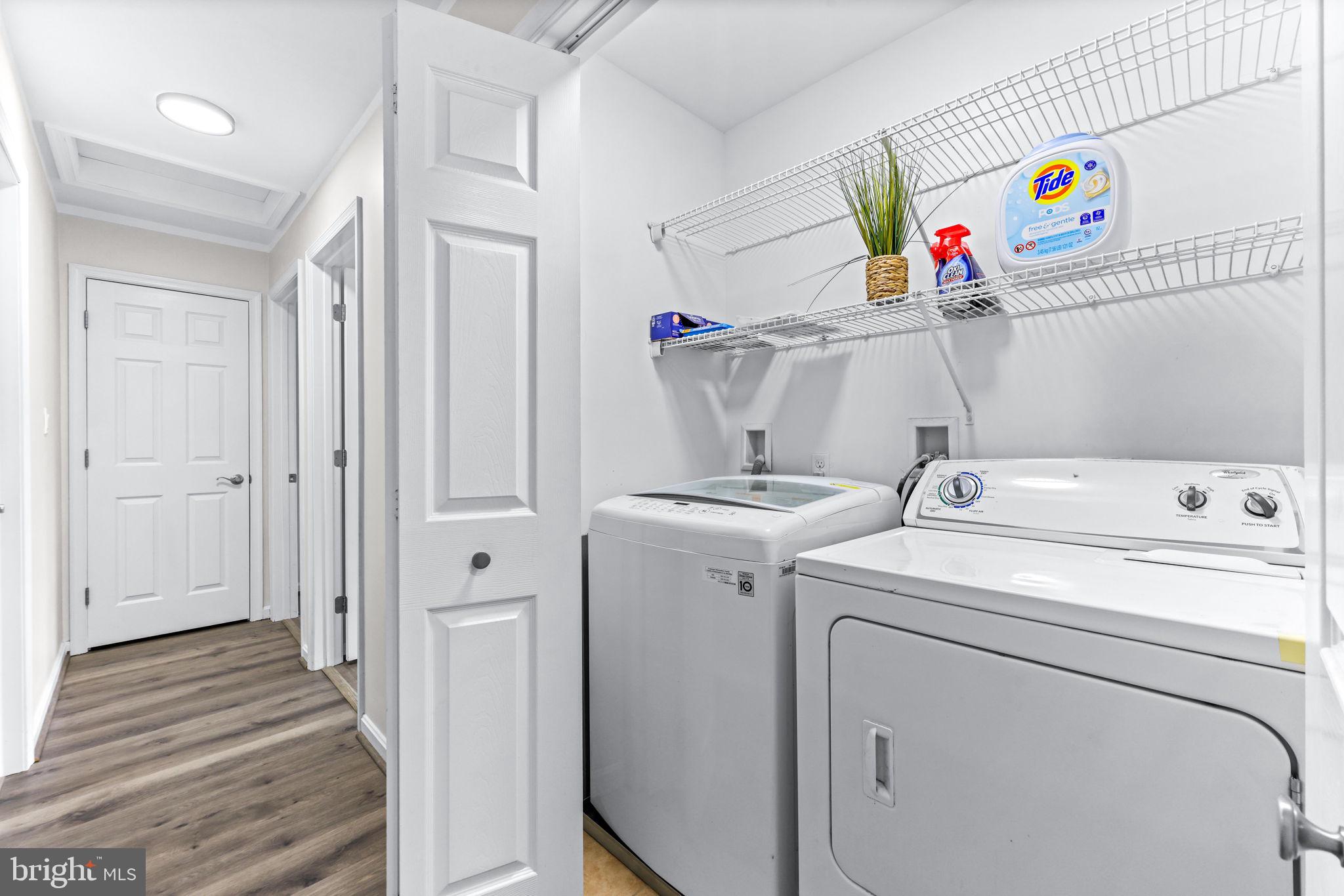 1439 Goodwood Avenue Baltimore, MD 21221 - Photo 25 of 49 a utility room with dryer and washer