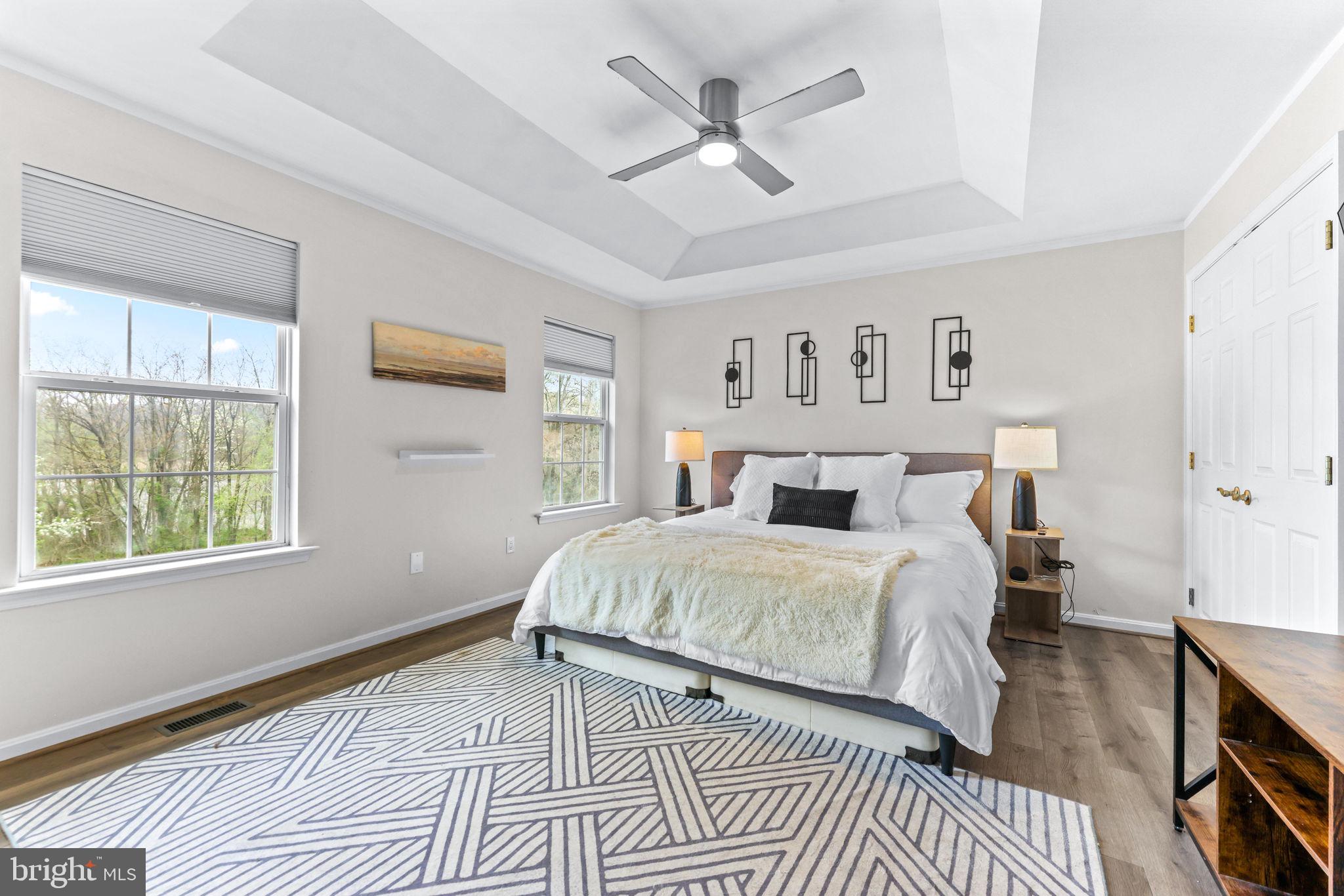 1439 Goodwood Avenue Baltimore, MD 21221 - Photo 27 of 49 a bedroom with a large bed and a window