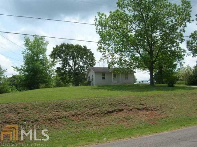 3029 Baker Road Gainesville, GA 30507 - Photo 1 of 1 a view of a backyard with large trees