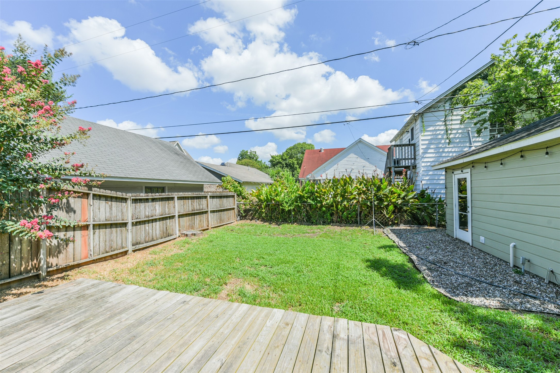 931 Teetshorn Street Houston, TX 77009 - Photo 22 of 25 a view of a house with a yard