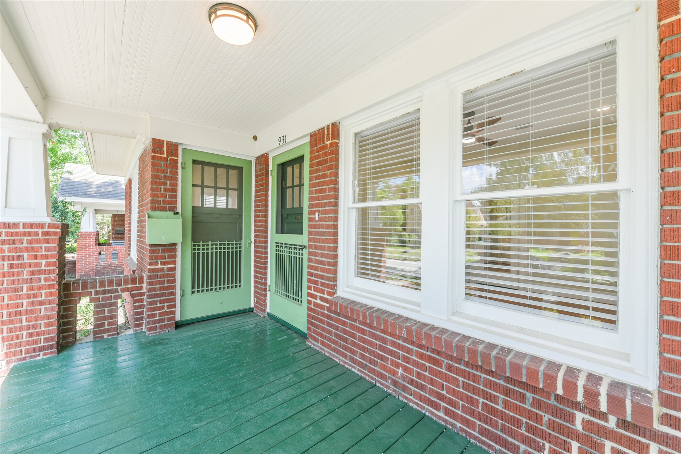 931 Teetshorn Street Houston, TX 77009 - Photo 4 of 25 a view of a bedroom with windows