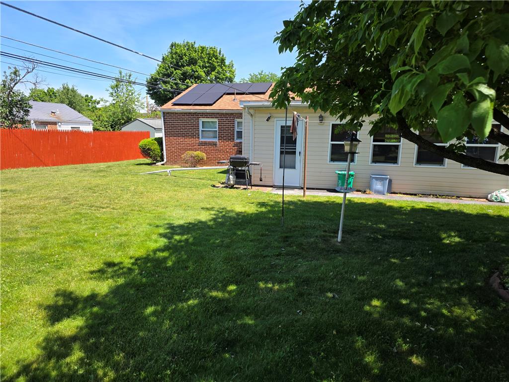 3134 Roxford Road Allentown, PA 18103 - Photo 5 of 34 A fenced backyard offers a private green oasis for outdoor enjoyment.