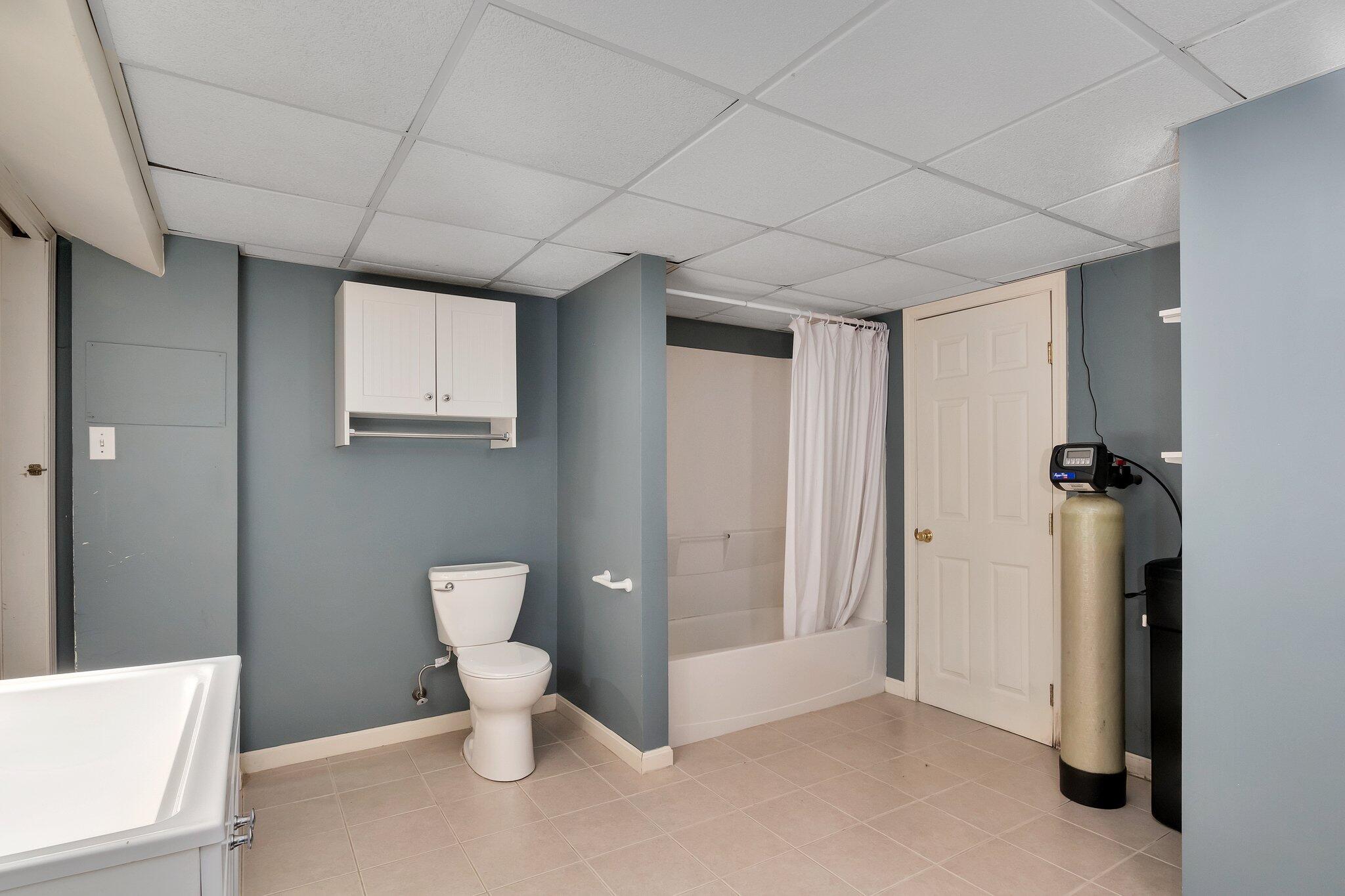 2 Windsor Way Mashpee, MA 02649 - Photo 34 of 53 a bathroom with a toilet and a shower