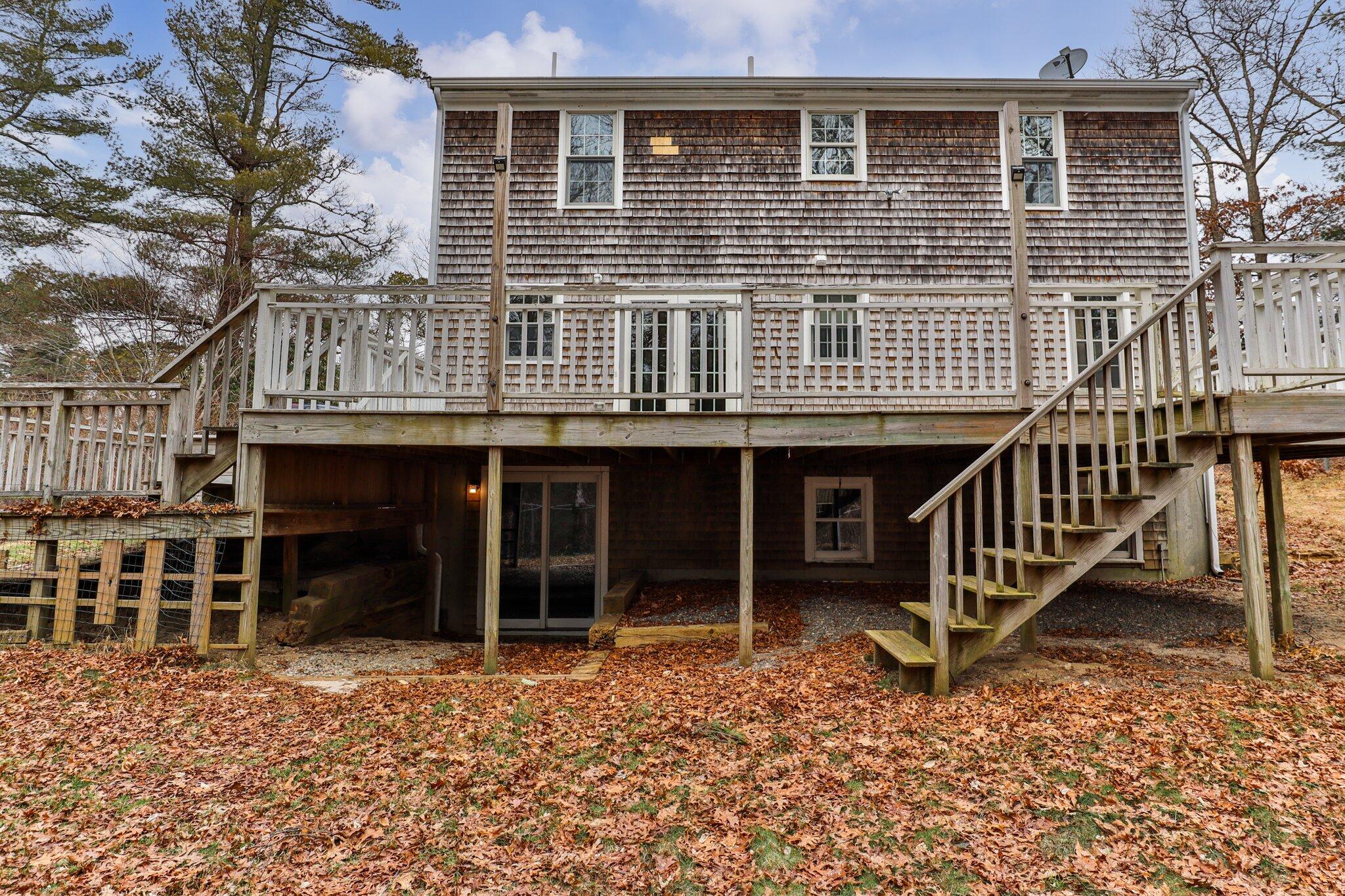 2 Windsor Way Mashpee, MA 02649 - Photo 39 of 53 a front view of a house with balcony