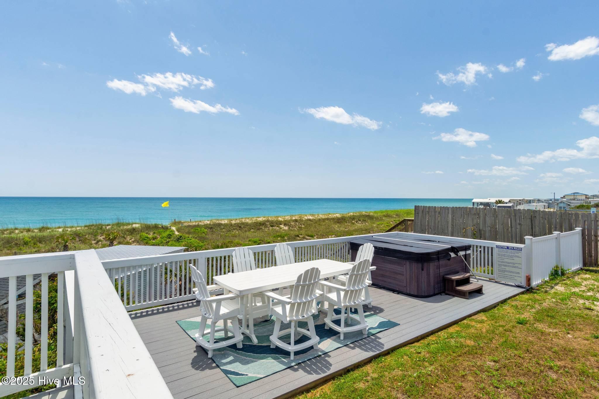 1829 Salter Path Road Indian Beach, NC 28512 - Photo 2 of 27 Elevated Outdoor Dining Area w/Hot Tub Overlooking Ocean