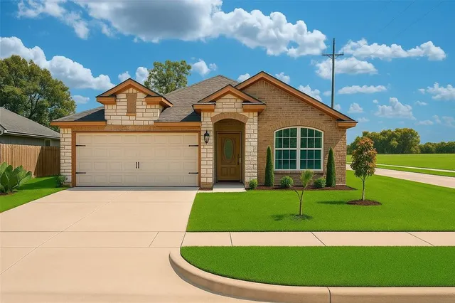 a view of a white house with a small yard and plants