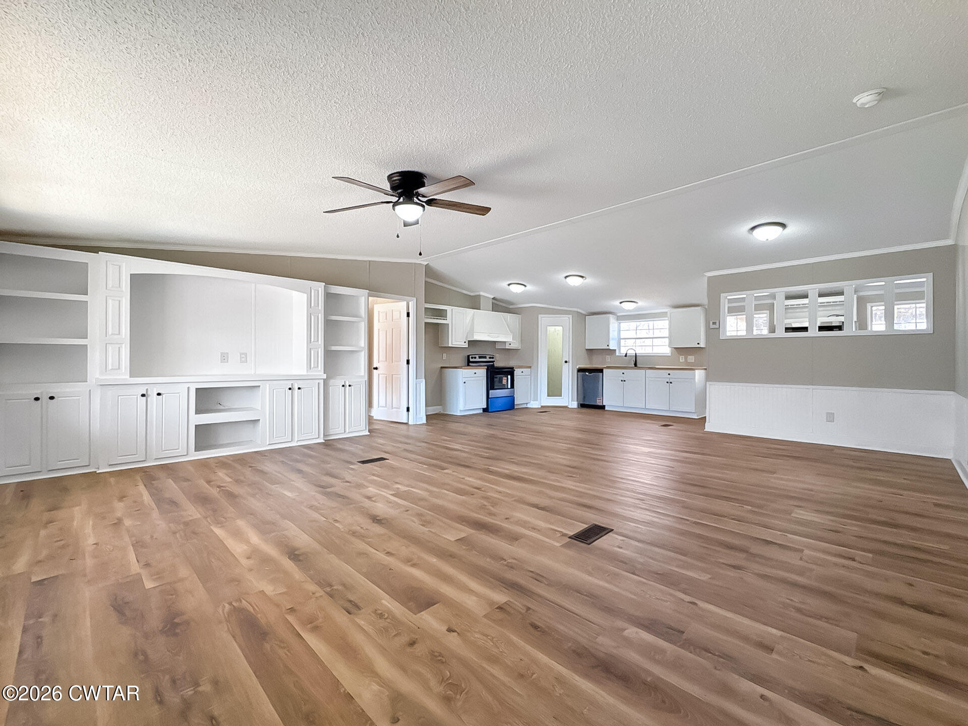 643 Eaton Brazil Road Trenton, TN 38382 - Photo 2 of 13 a view of a kitchen with a sink and a window