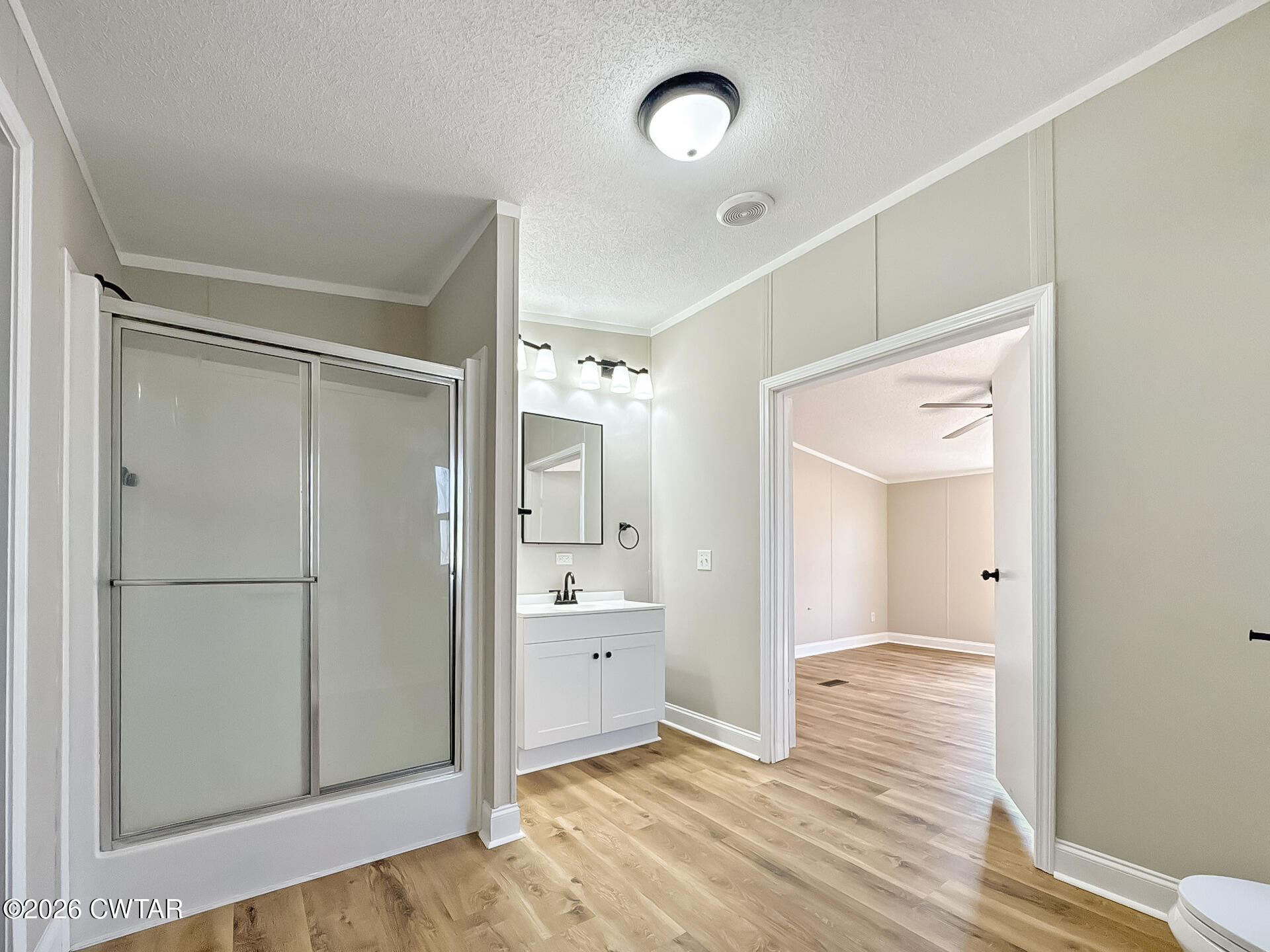 643 Eaton Brazil Road Trenton, TN 38382 - Photo 6 of 13 a bathroom with a shower and a sink