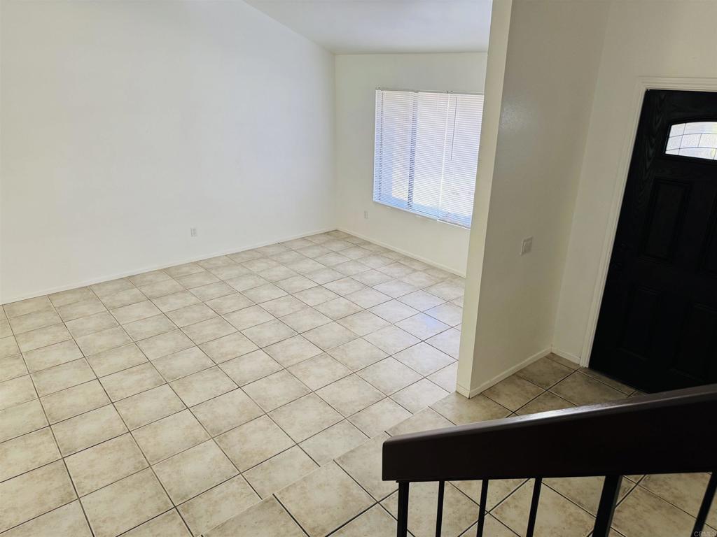 9170 Circulo Margen Spring Valley, CA 91977 - Photo 4 of 9 a view of a room with a window