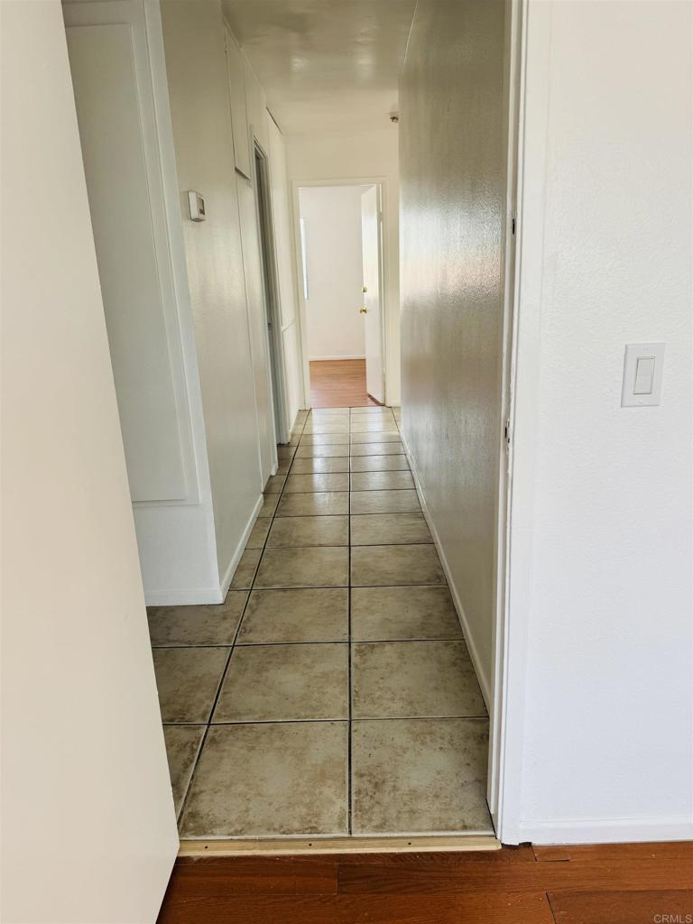 9170 Circulo Margen Spring Valley, CA 91977 - Photo 7 of 9 a view of a hallway