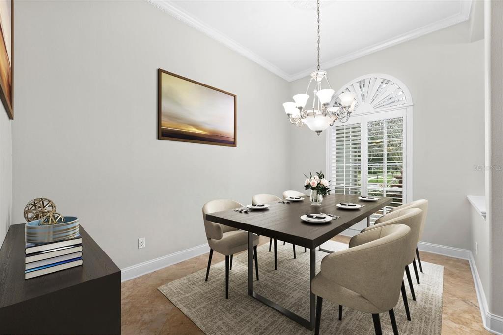 5614 Eagleglen Place Lithia, FL 33547 - Photo 14 of 35 a view of a dining room with furniture and chandelier