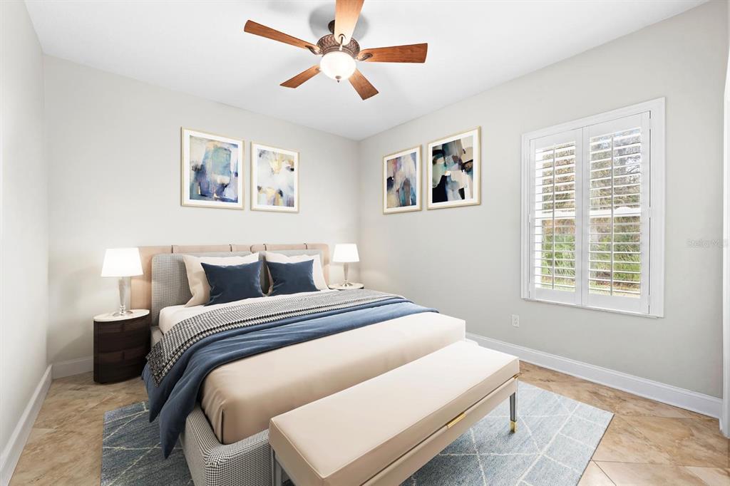 5614 Eagleglen Place Lithia, FL 33547 - Photo 19 of 35 a bedroom with a large bed and a window