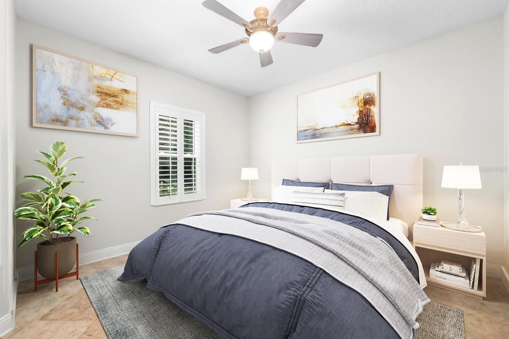 5614 Eagleglen Place Lithia, FL 33547 - Photo 21 of 35 a bedroom with bed and a chandelier