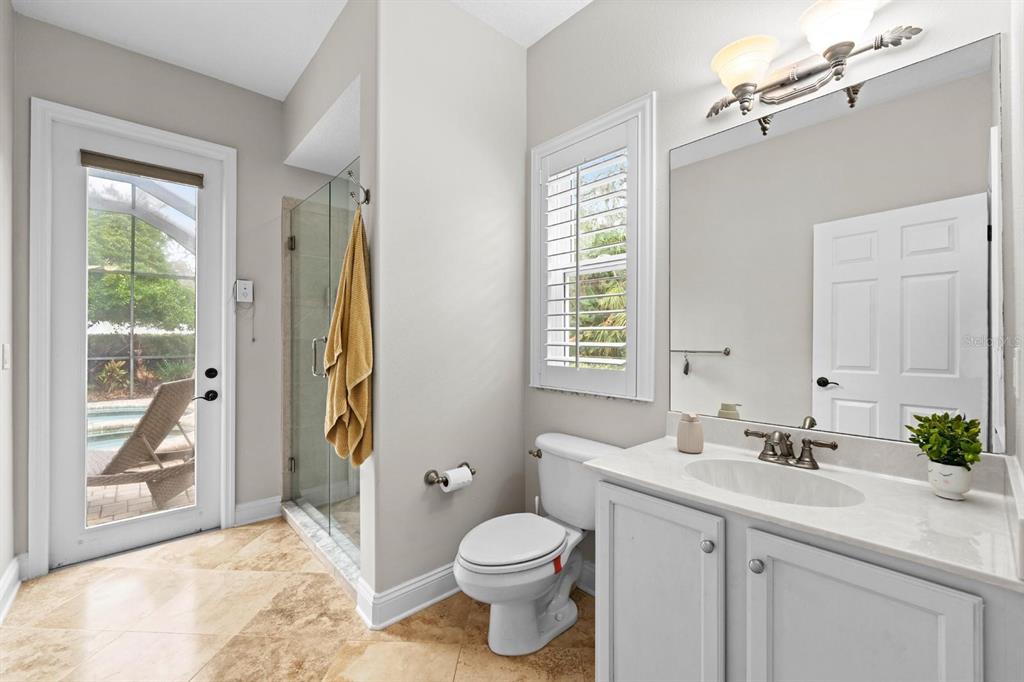 5614 Eagleglen Place Lithia, FL 33547 - Photo 23 of 35 a bathroom with a sink toilet and shower