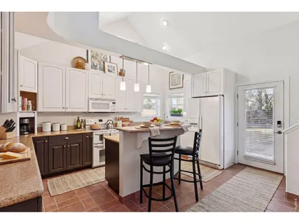 a view of balcony with wooden floor