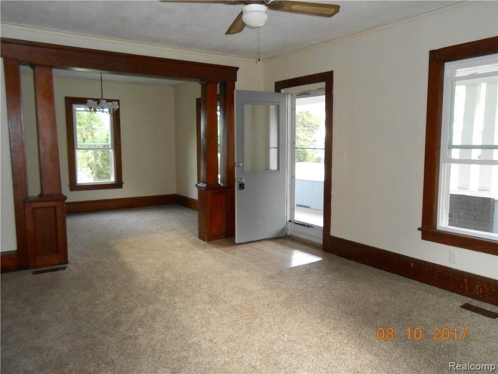 130 Mason Road Howell, MI 48843 - Photo 14 of 33 Living room connected to the dining area