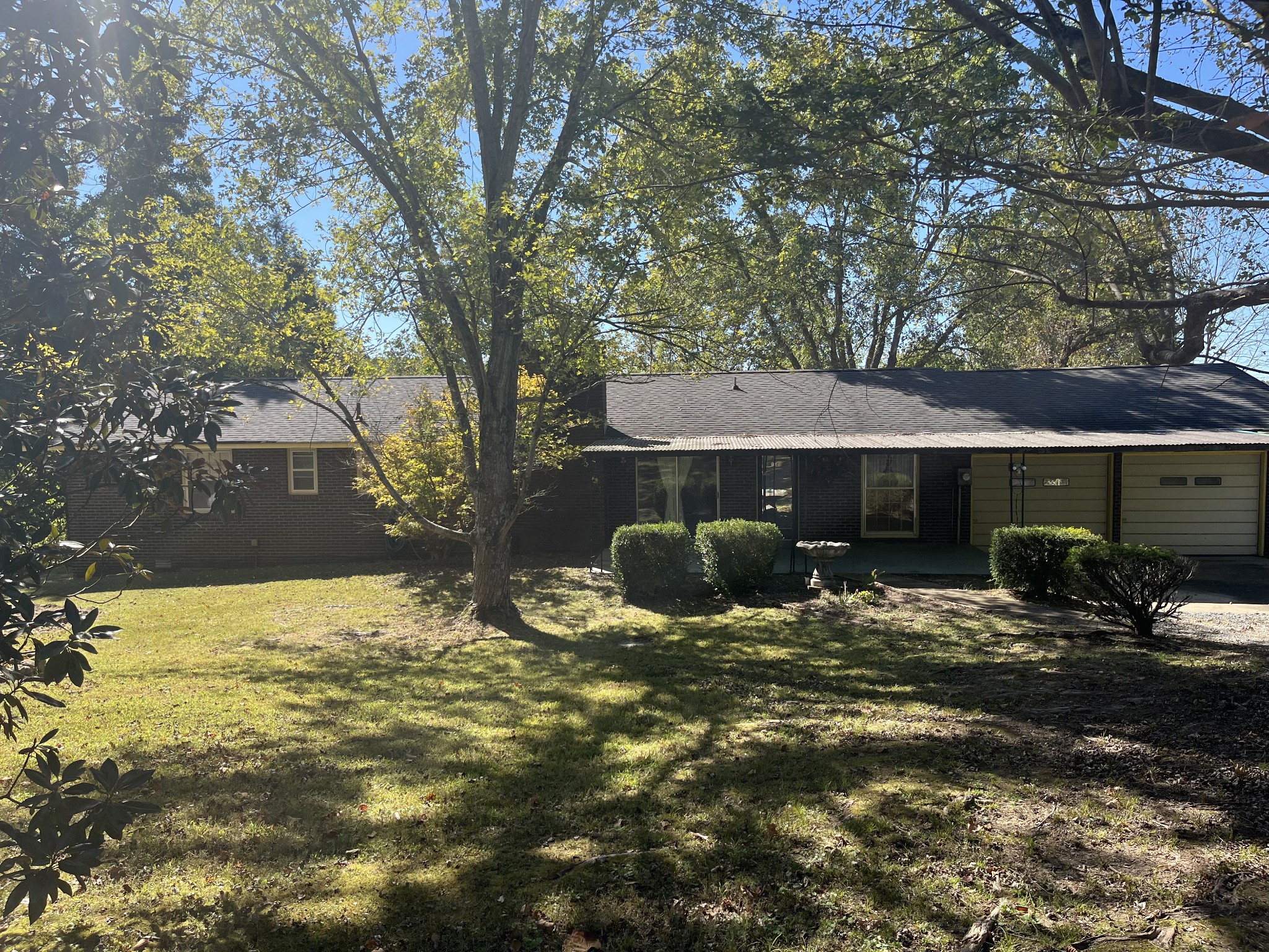 1125 Macon Wall Road Ashland City, TN 37015 - Photo 2 of 25 a view of a house with backyard outdoor space and sitting area