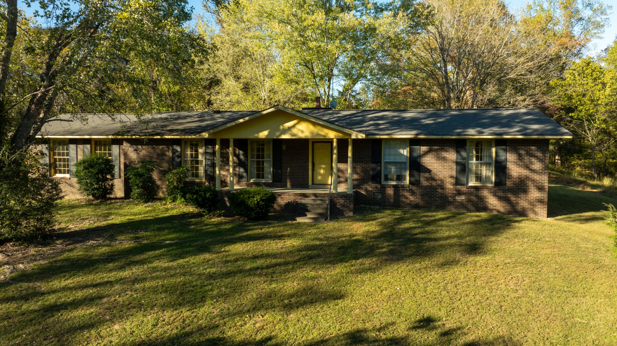 1125 Macon Wall Road Ashland City, TN 37015 - Photo 25 of 25 a view of a house with swimming pool and sitting area