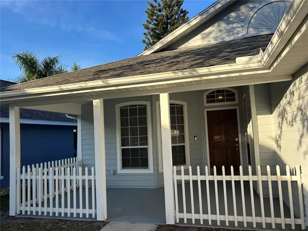 a view of a porch with a bench