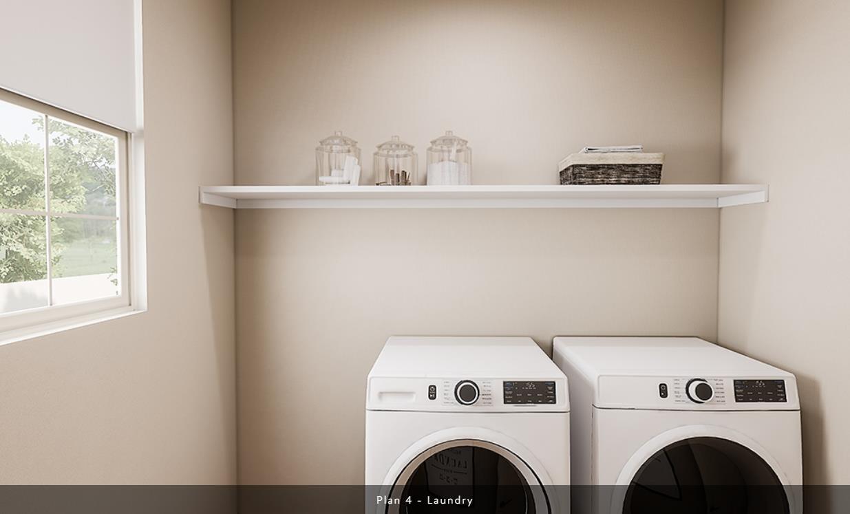527 Willow Bend Lathrop, CA 95330 - Photo 15 of 22 a view of washer and dryer with kitchen in the background