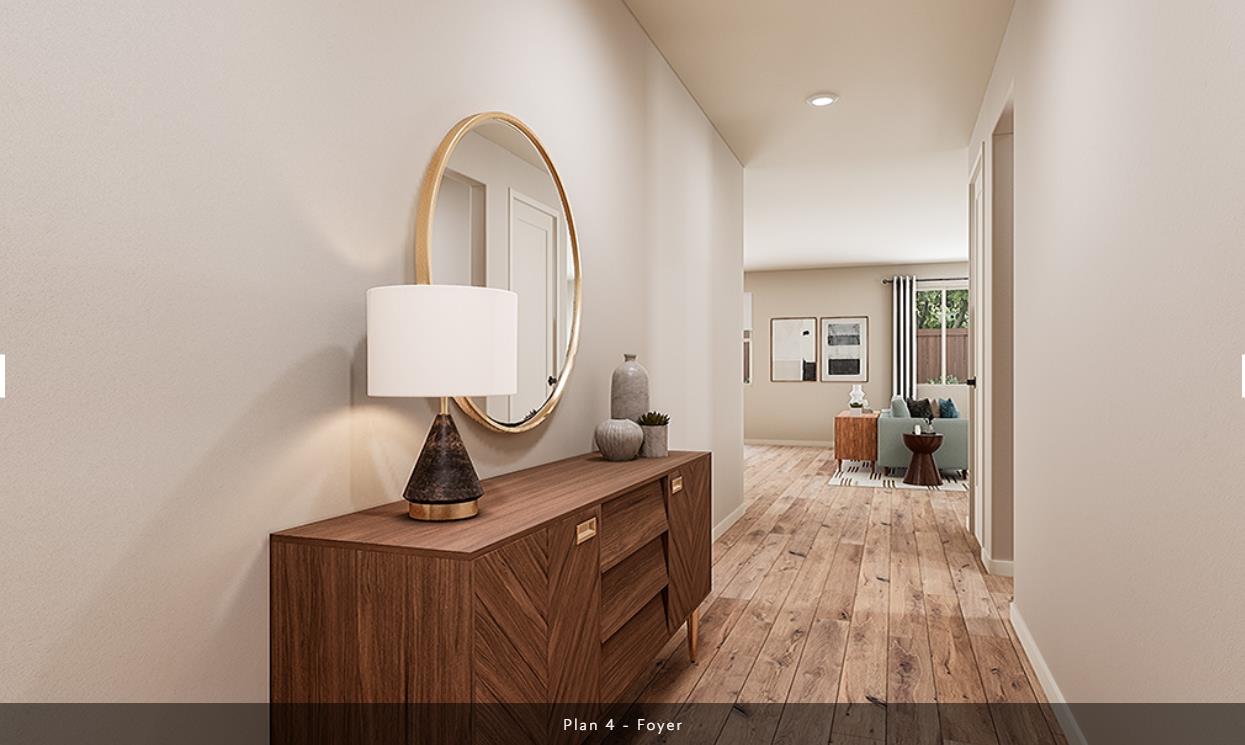 527 Willow Bend Lathrop, CA 95330 - Photo 9 of 22 a living room with a couch and wooden floor