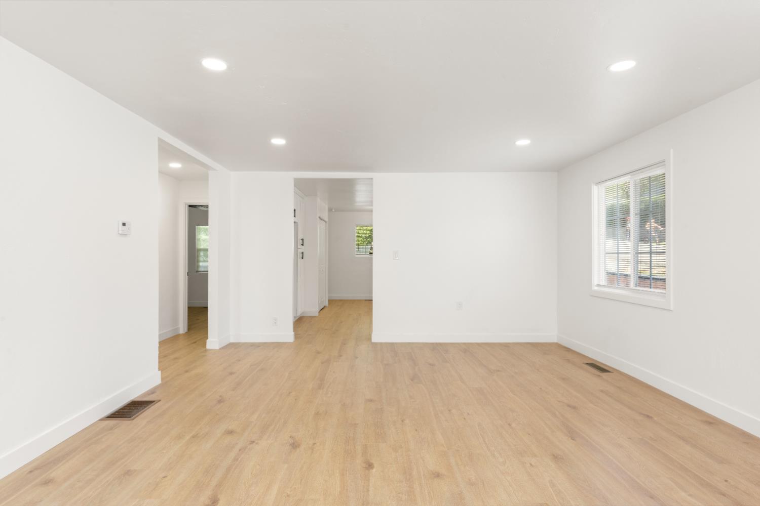 185 Mill Street Sutter Creek, CA 95685 - Photo 23 of 77 wooden floor in an empty room with a window