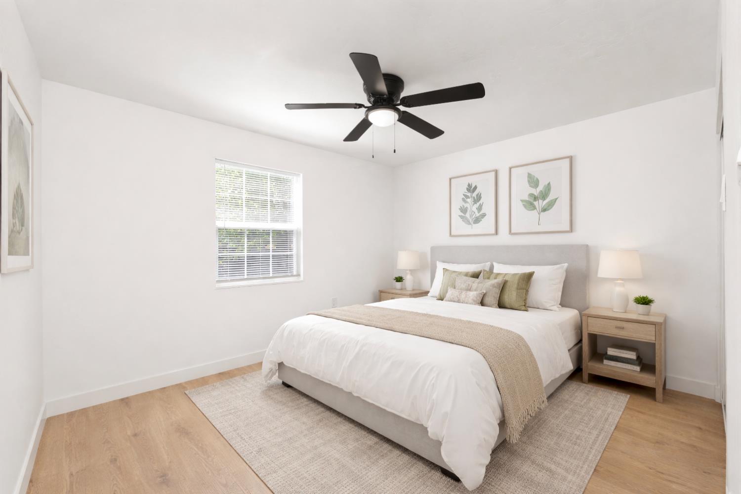 185 Mill Street Sutter Creek, CA 95685 - Photo 39 of 77 a bedroom with a bed and window