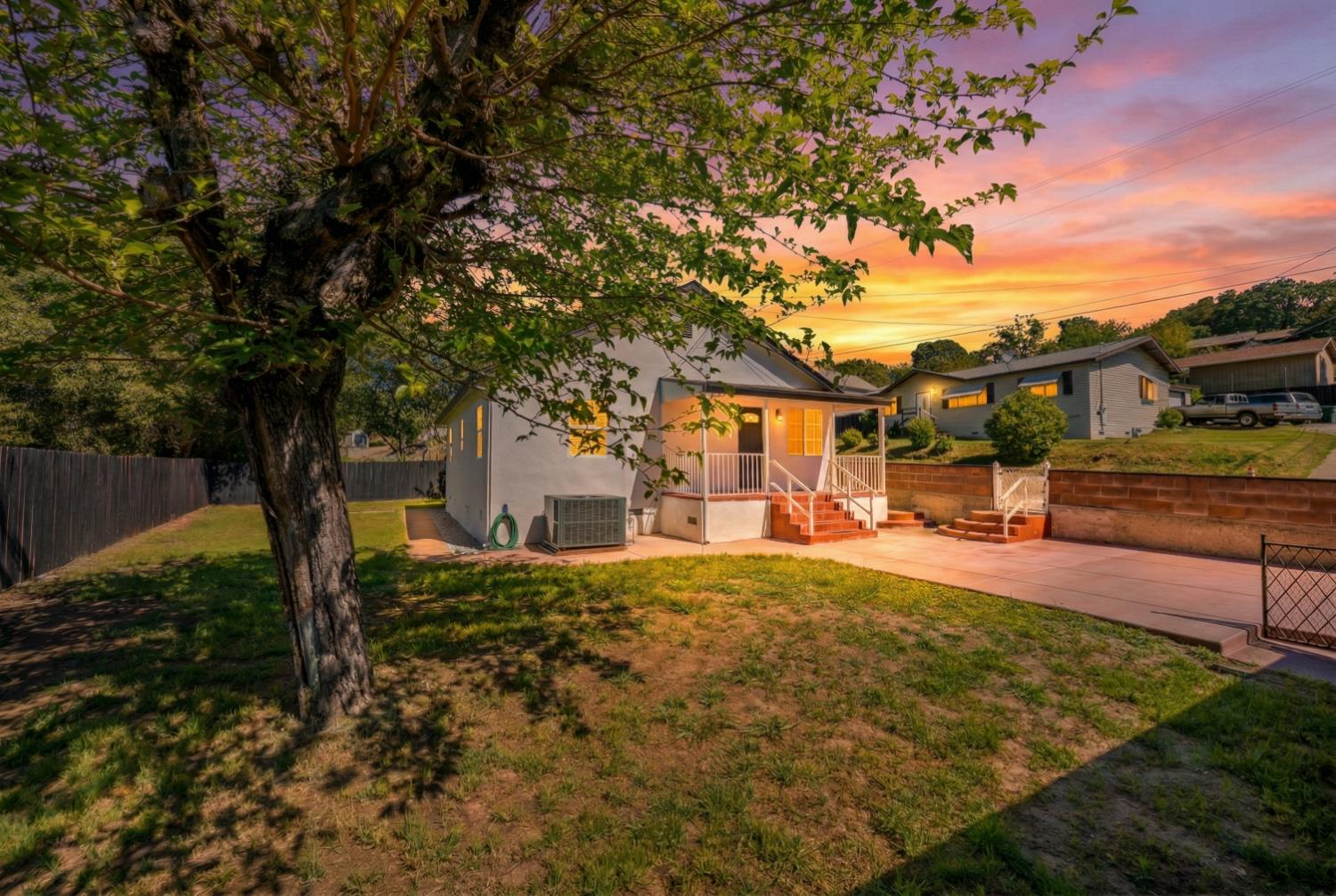 185 Mill Street Sutter Creek, CA 95685 - Photo 10 of 77 a front view of a house with a yard and garage